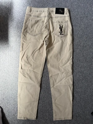 YSL gray skinny jeans - Size M, true to size. Just like new. Unused, please feel free to ask questions if needed.