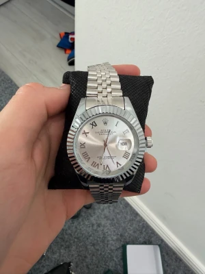 silver and white rollie watch - As new, send an offer