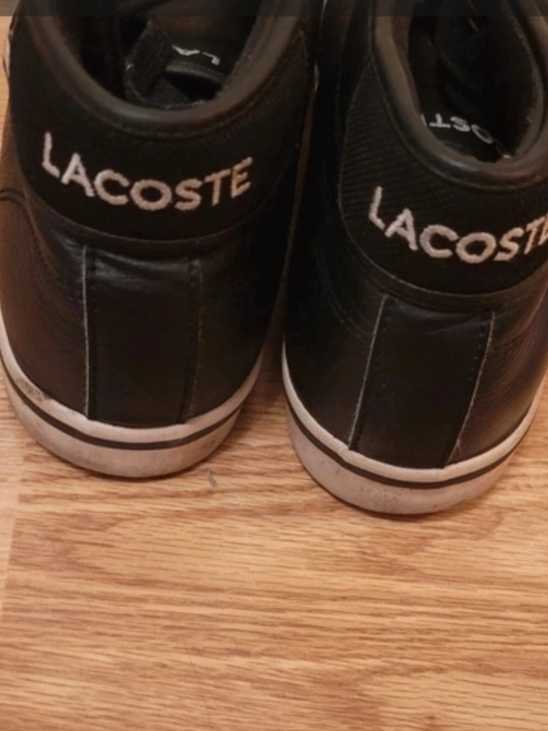 Svarta Lacoste sneakers i läder