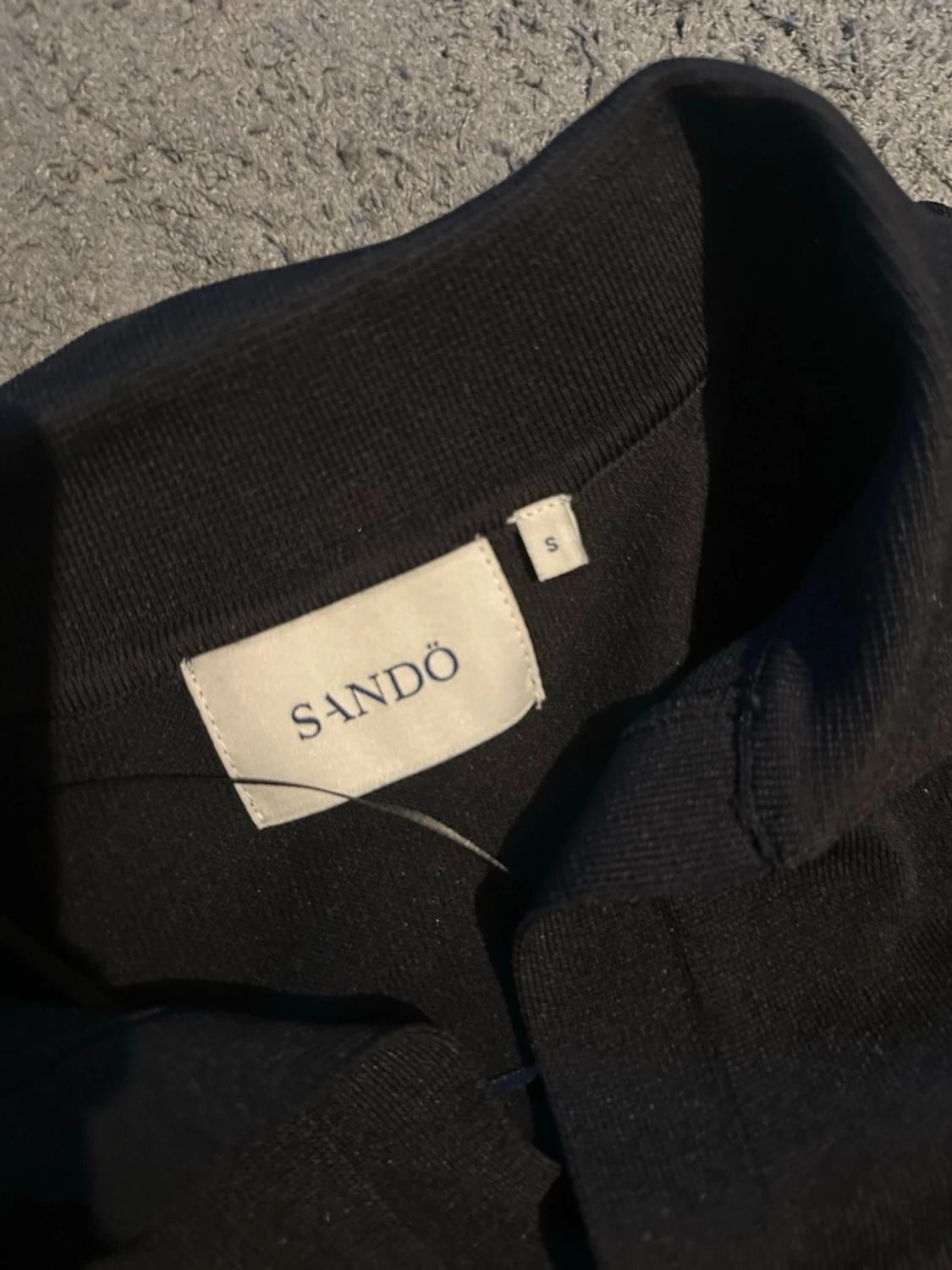 Svart pikétröja från Sandö - 2
