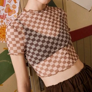 Meshtopp  - Fin meshtopp från UrbanOutfitters. Använd ett fåtal gånger.