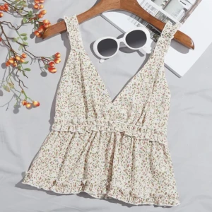 Blommig topp - Blommig topp andvänd Max 5 gånger fin kvalite 