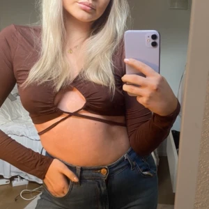 Fest topp - Brun festtopp aldrig använd! Storlek S