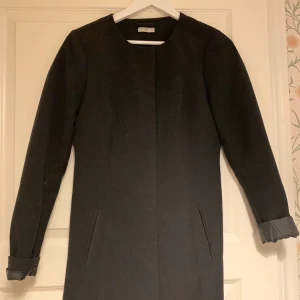 Svart kappa - Tunn kappa.