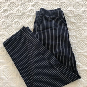 Pyjamas byxor  - Blåa pyjamasbyxor från uniqlo. Använda Max 7 gånger. 