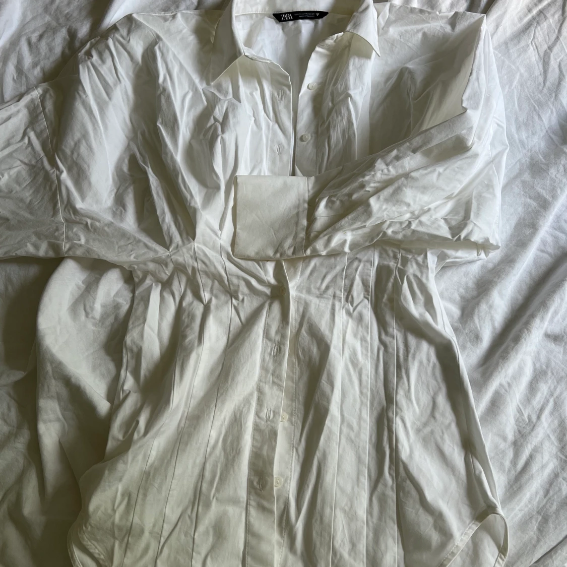 Skjorta med detaljer  - 91