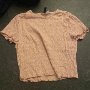 Rosa top  - En rosa top 