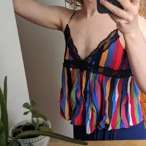 Colourful stripe Zara crop top. This is really beautiful and flowy on, selling as it doesn't fit my bust anymore. Any questions just ask. It's in such good condition, it's only been worn a few times but literally about three times before I decide it was not for me 