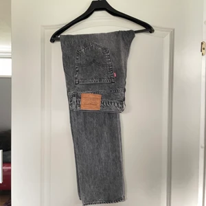 Levi’S premium  ”502”jeans - Levis mörkgråa premium baggy jeans, ”502” W33 L32
