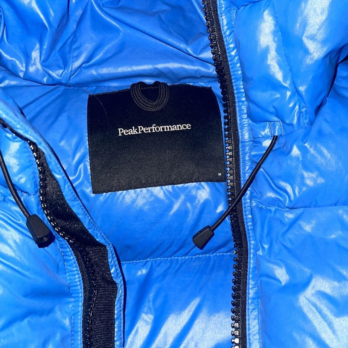 Blå peak performance dunjacka stl M - 91