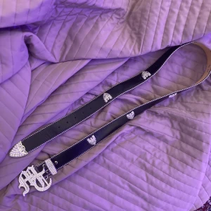 Tuttolente svart ‘MT’ belt - Price isn’t set There is a hole put in that fits size small and I can fix another to fit your size if you want but originally it’s a size XL.