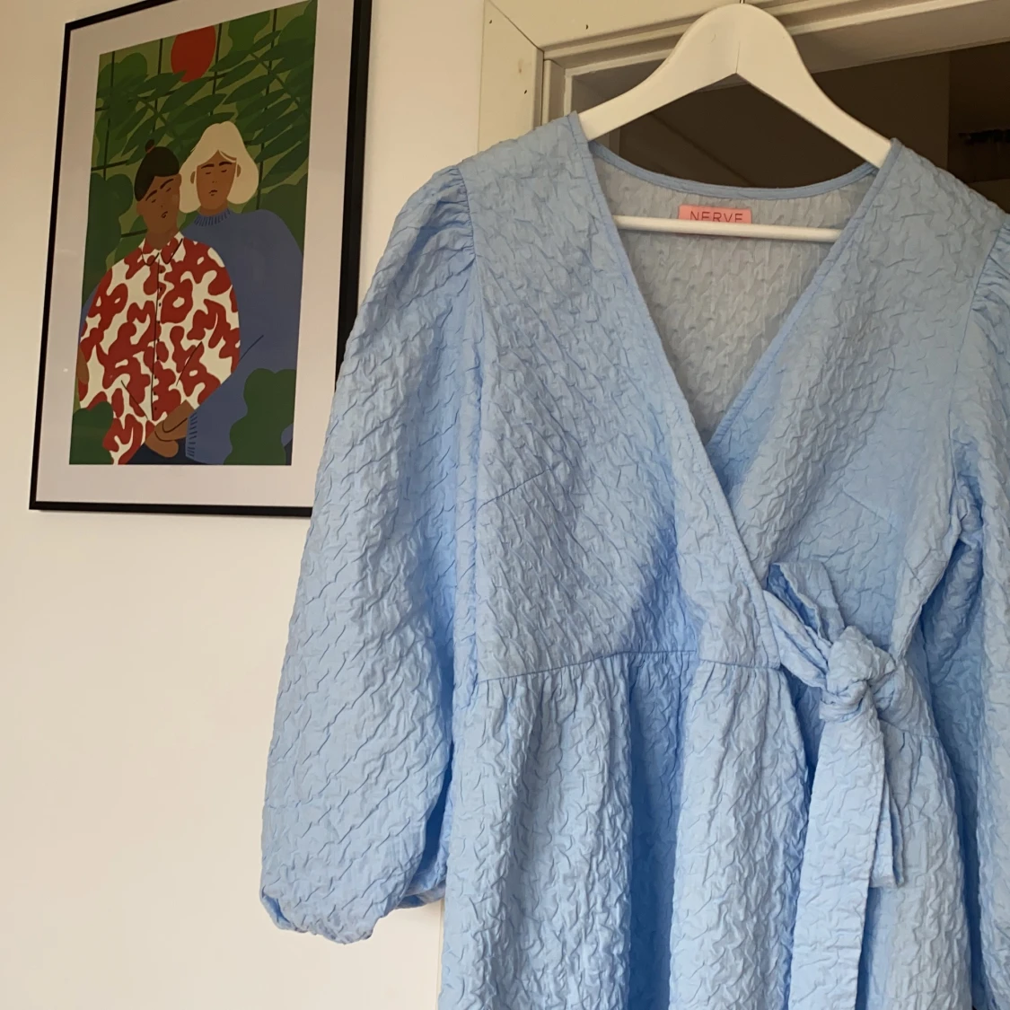 Ljusblå omlottklänning - 90