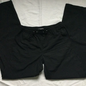 Byxor - Svarta långa byxor, passar till xs-m