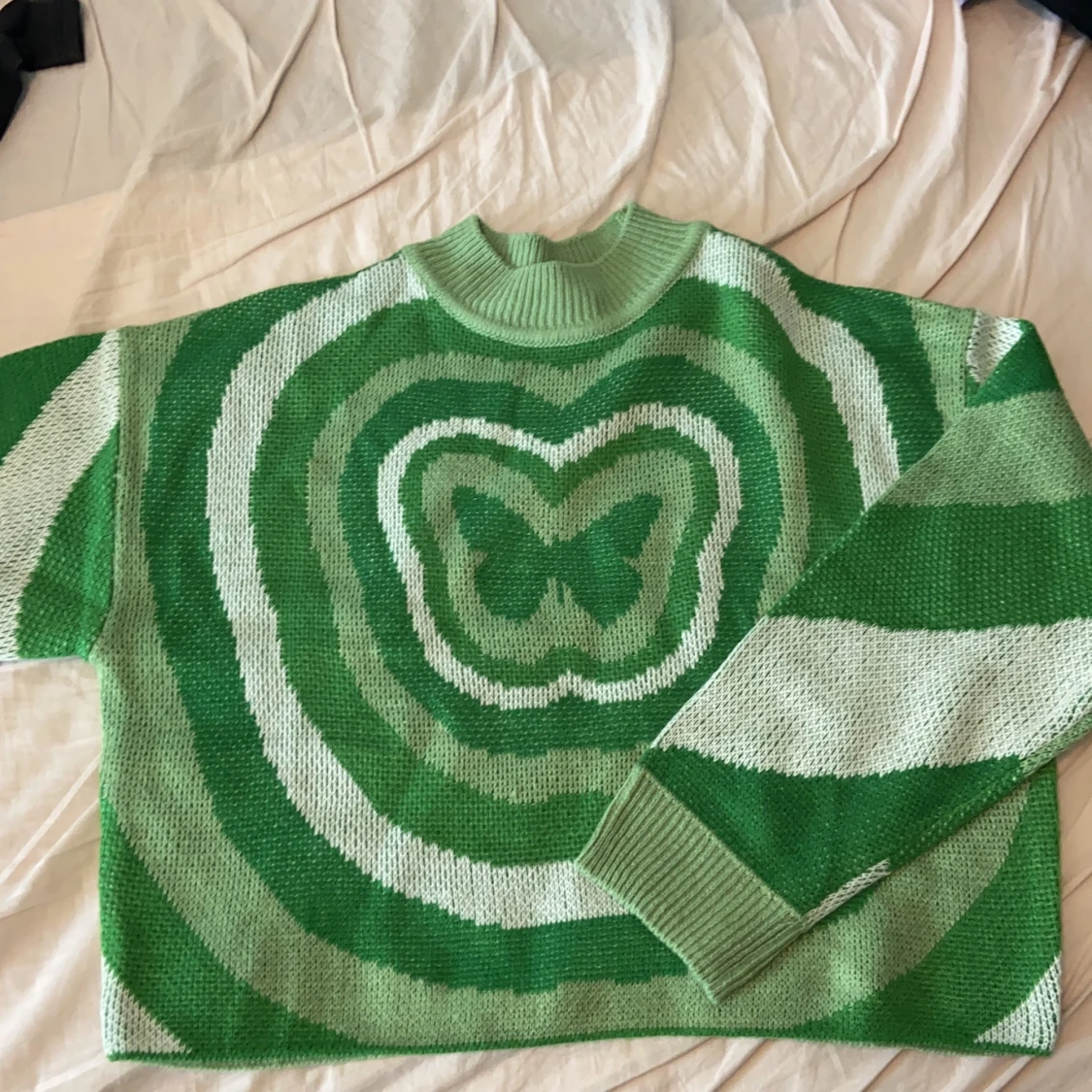 Stickad grön tröja