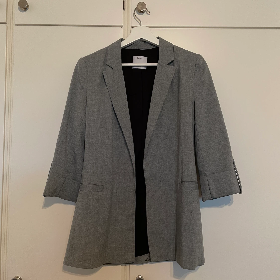 Grå kavaj från Bershka i storlek S/M