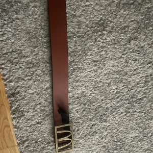 McDonalds bälte - Säljer ett McDonalds bälte, tror det är ca 100cm långt.