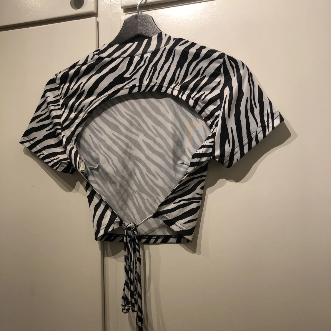 Topp med öppen rygg