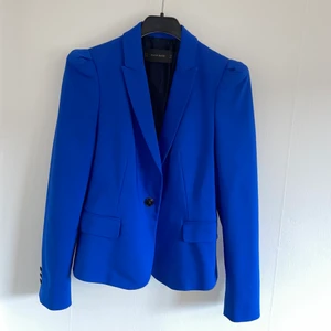 Blå Kavaj - En fin blå kavaj i storleken Small