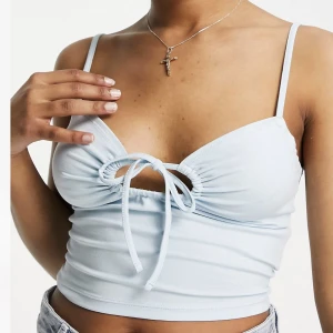 Babyblått linne - Ett babyblått linne från ASOS Design i storlek 40, aldrig använt, endast testat