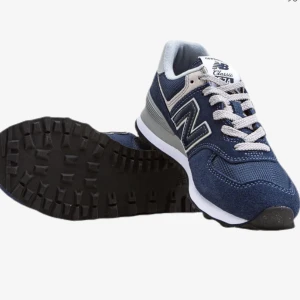 Skor - New Balance 574 i storlek 40, använda max 3 gånger