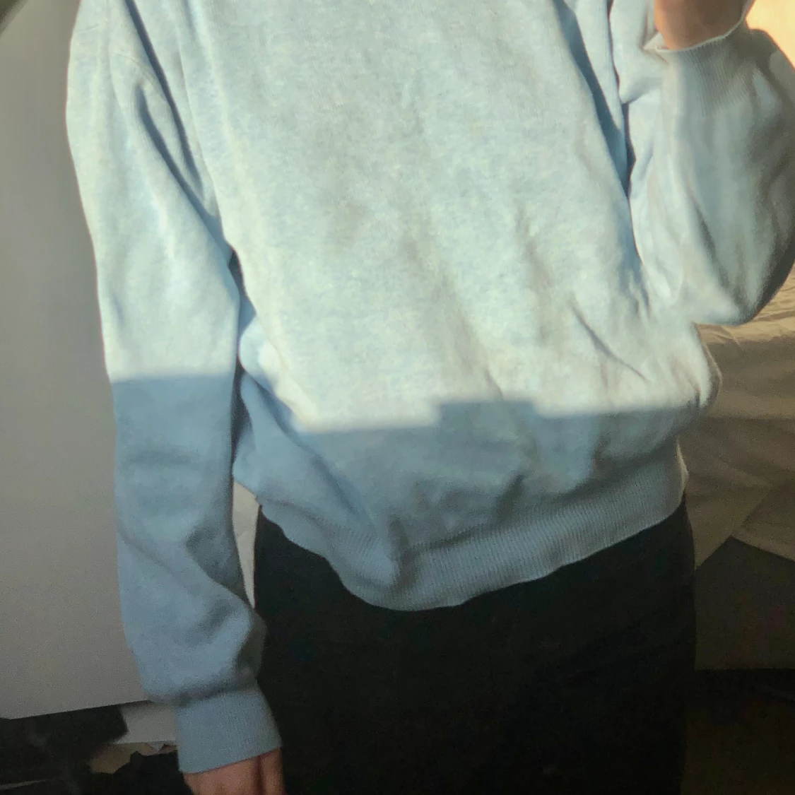 Ljusblå tröja