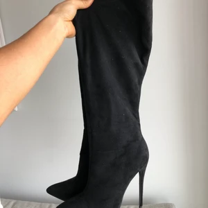 Stövlar med klack - Använda en gång 