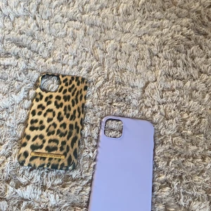 Telefon skal💓 - Säljer dessa 2 super söta mobilskal, ett leopard från ideal of sweden och ett lila silikon skal från Elgiganten, köpte får 250 styck, kontakta för fler bilder. Pris kan diskuteras 💓( de blir 80 kr stuck)