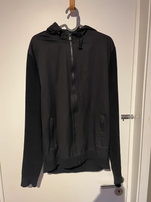 Barbour cardigan  - Strl M  Färg svart 