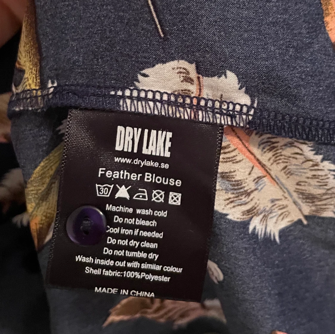 Blus fjädrar Dry lake medium - 91