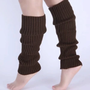 Benvärmare - brun - Säljer ett par bruna benvärmare för 50 kr + frakt. Kan skicka med frimärken om det önskas för billigare pris