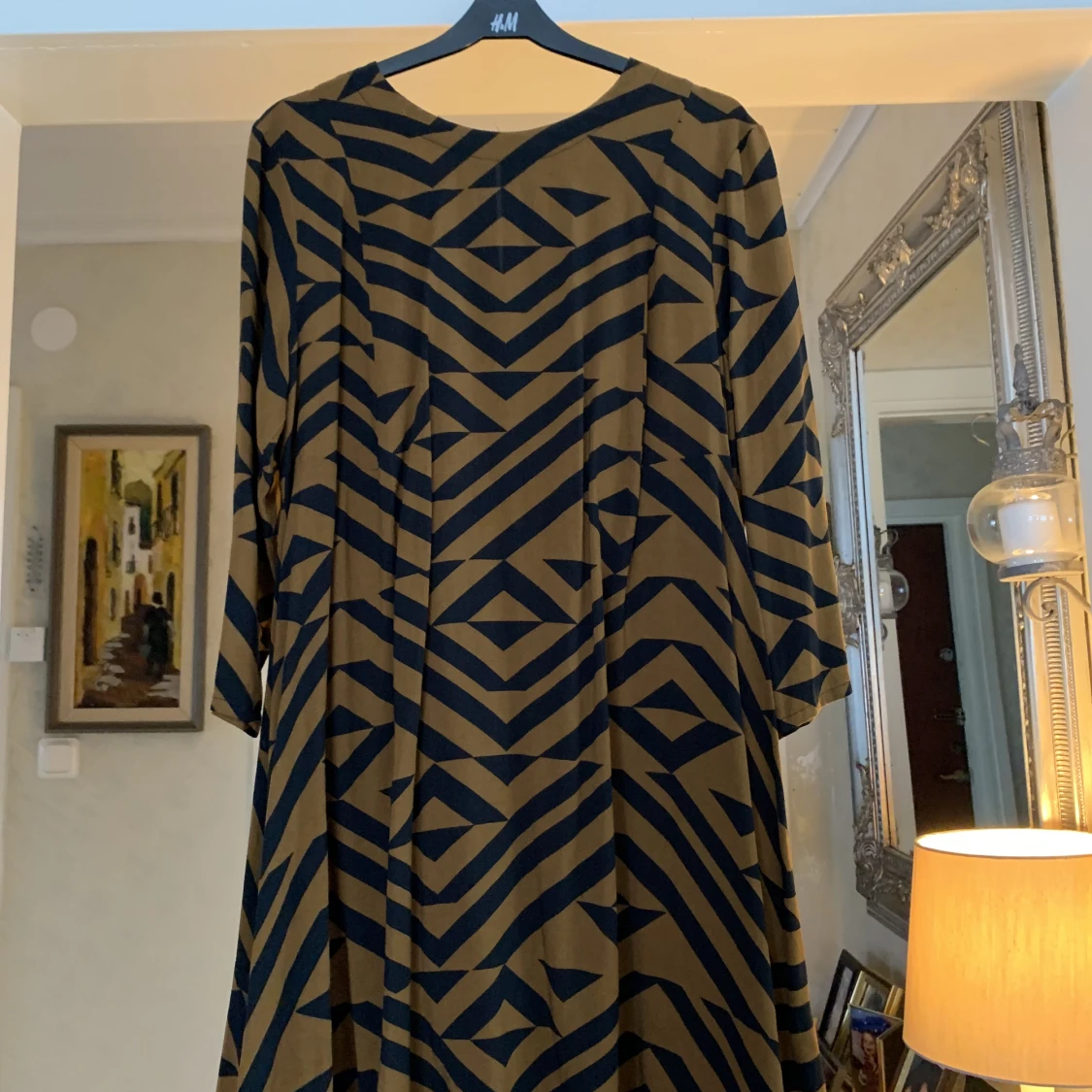 Brun klänning i viskos st44 - 90