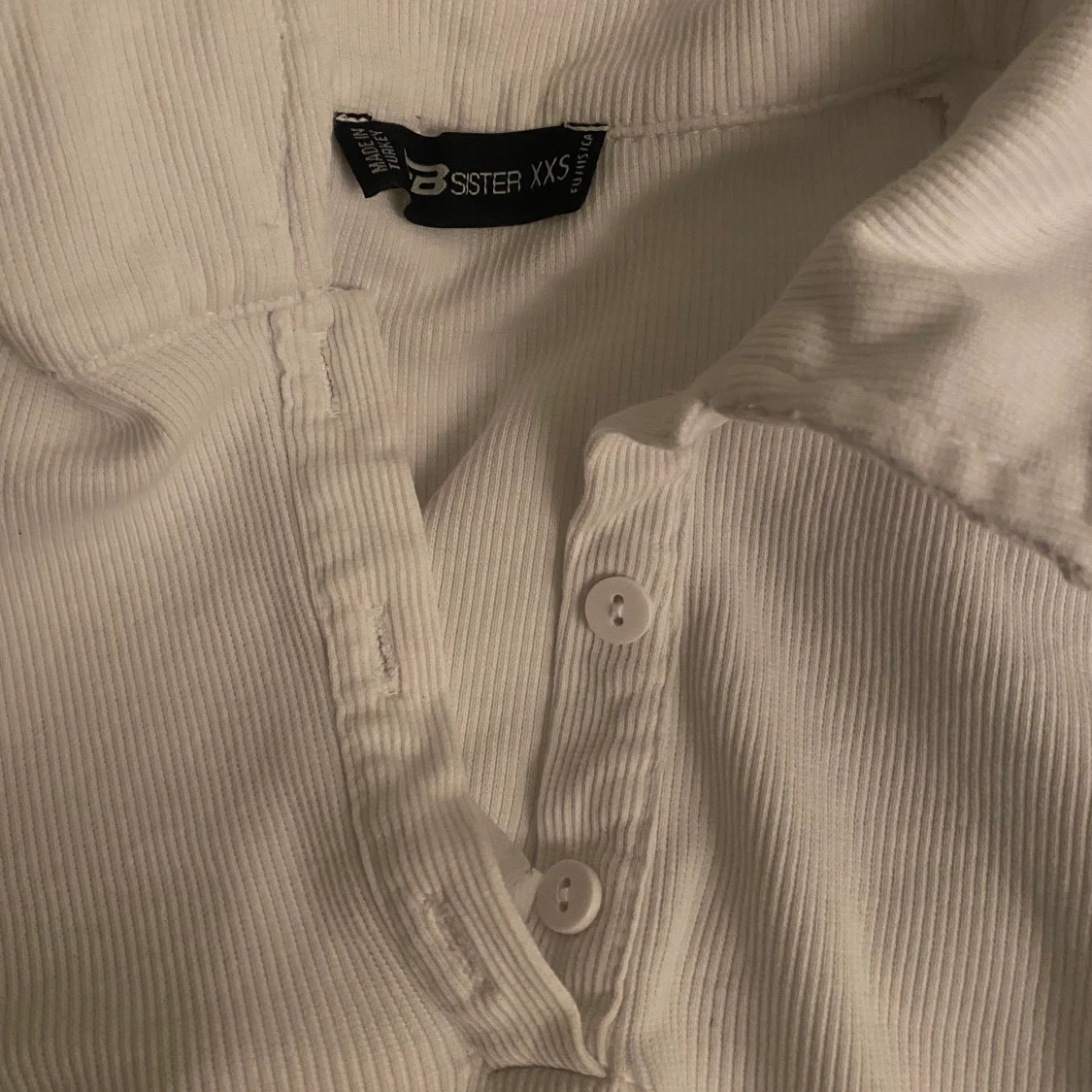 Långärmad med knappar - 90