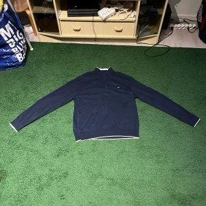 Michael Kors Qwarter zip - This is an navy blue qwarter zip that is a little too big for me.( my size is about a large for context.) it has never been used and and I am willing to be flexible with the price. If you have any questions please send a message to me!