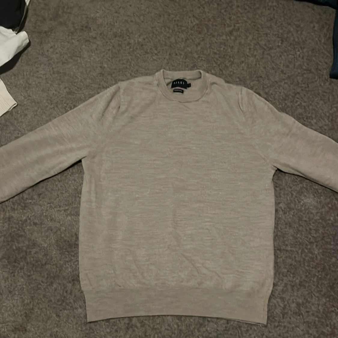 Beige merinoullströja från Riley