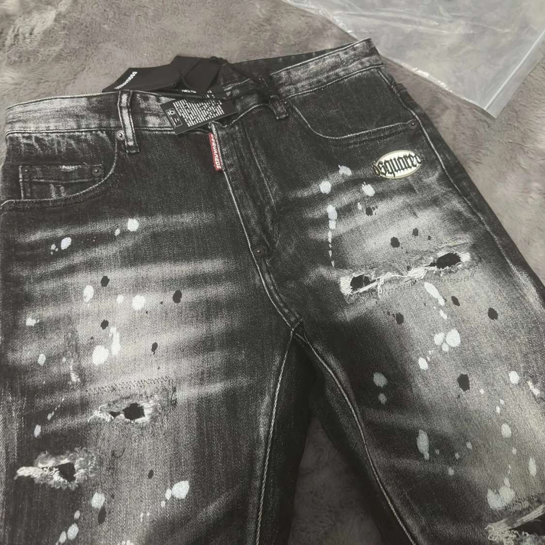Svarta Dsquared2 jeans med färgstänk