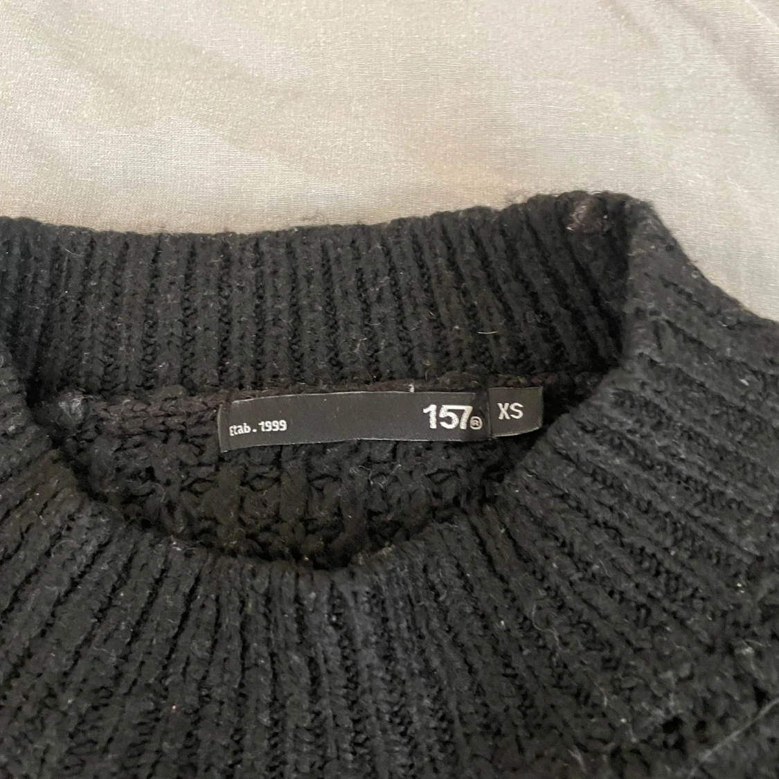 Svart stickad tröja från 157 - 1