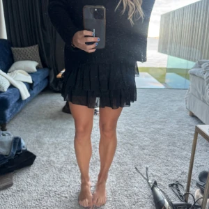 Volang kjol - Svart volang kjol i storlek s