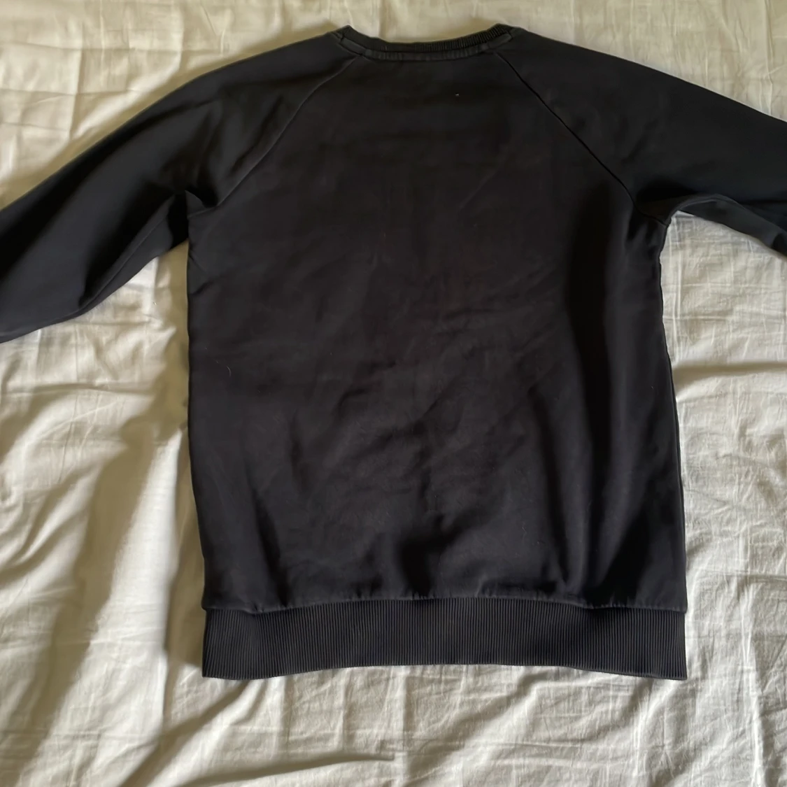 Svart sweatshirt från Peak Performance - 1