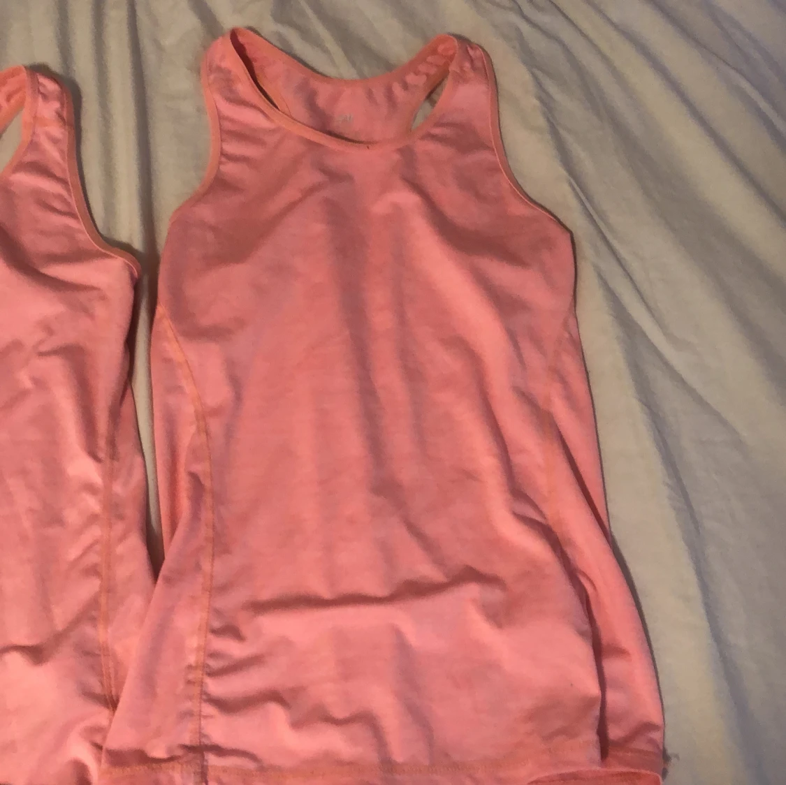 2 rosa linnetoppar från H&M - 2