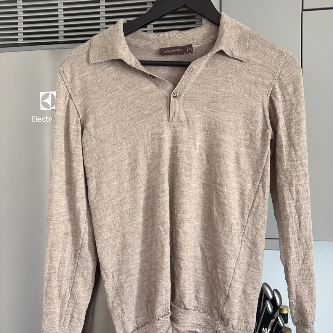 Beige pikétröja från Oscar Jacobson