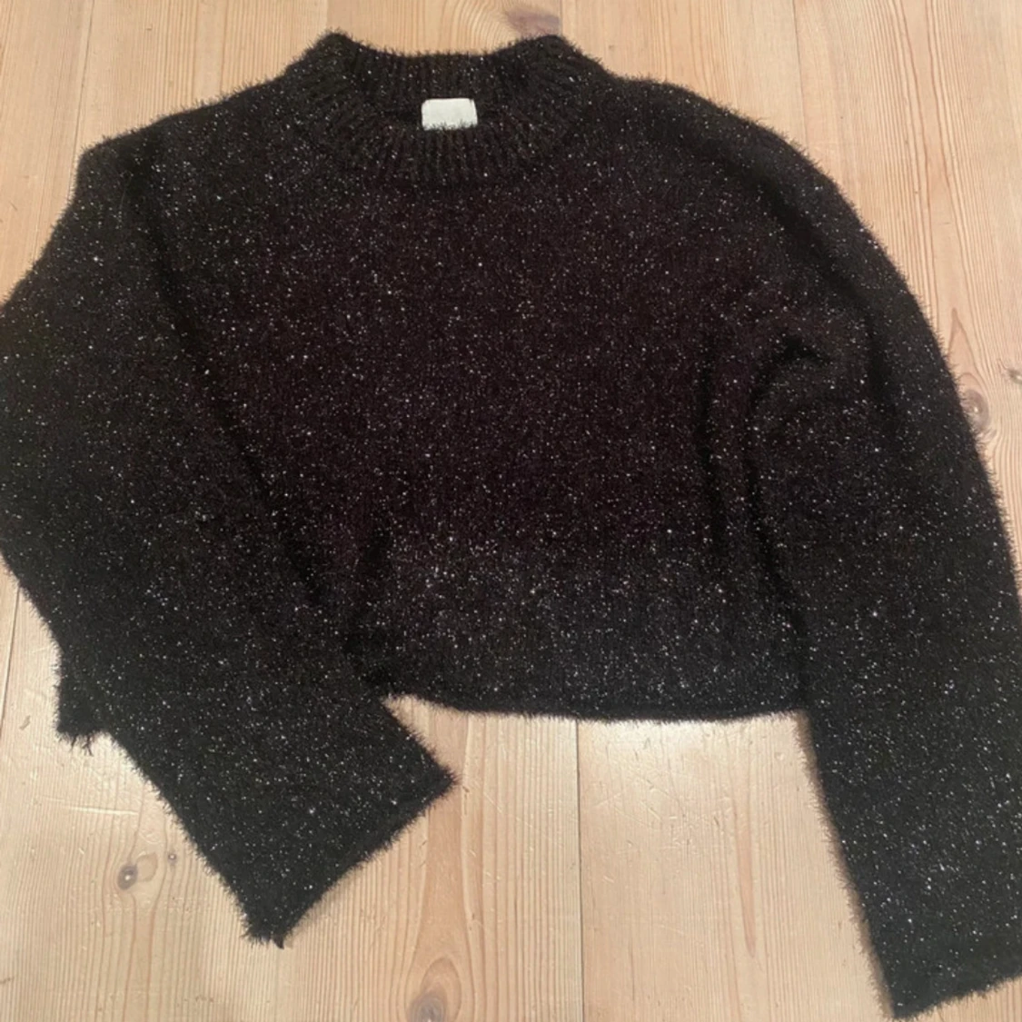 Svart glittrig stickad tröja - 1