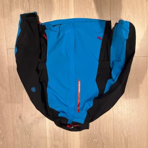 Abacus regn och vindjacka st 140 - Windbreaker en inneficka storlek 140 org pris 1199kr