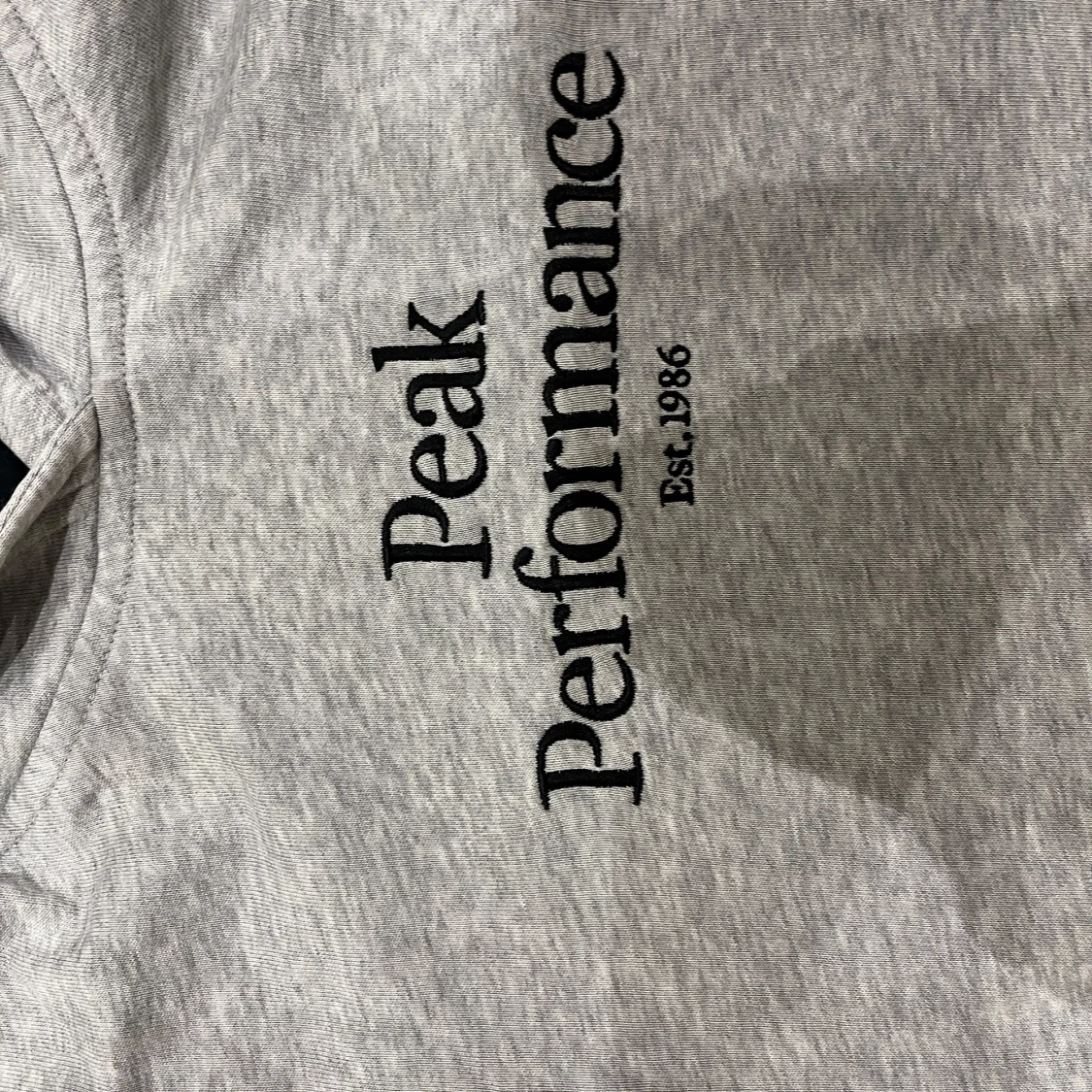 Grå hoodie Peak Performance 160 - 1