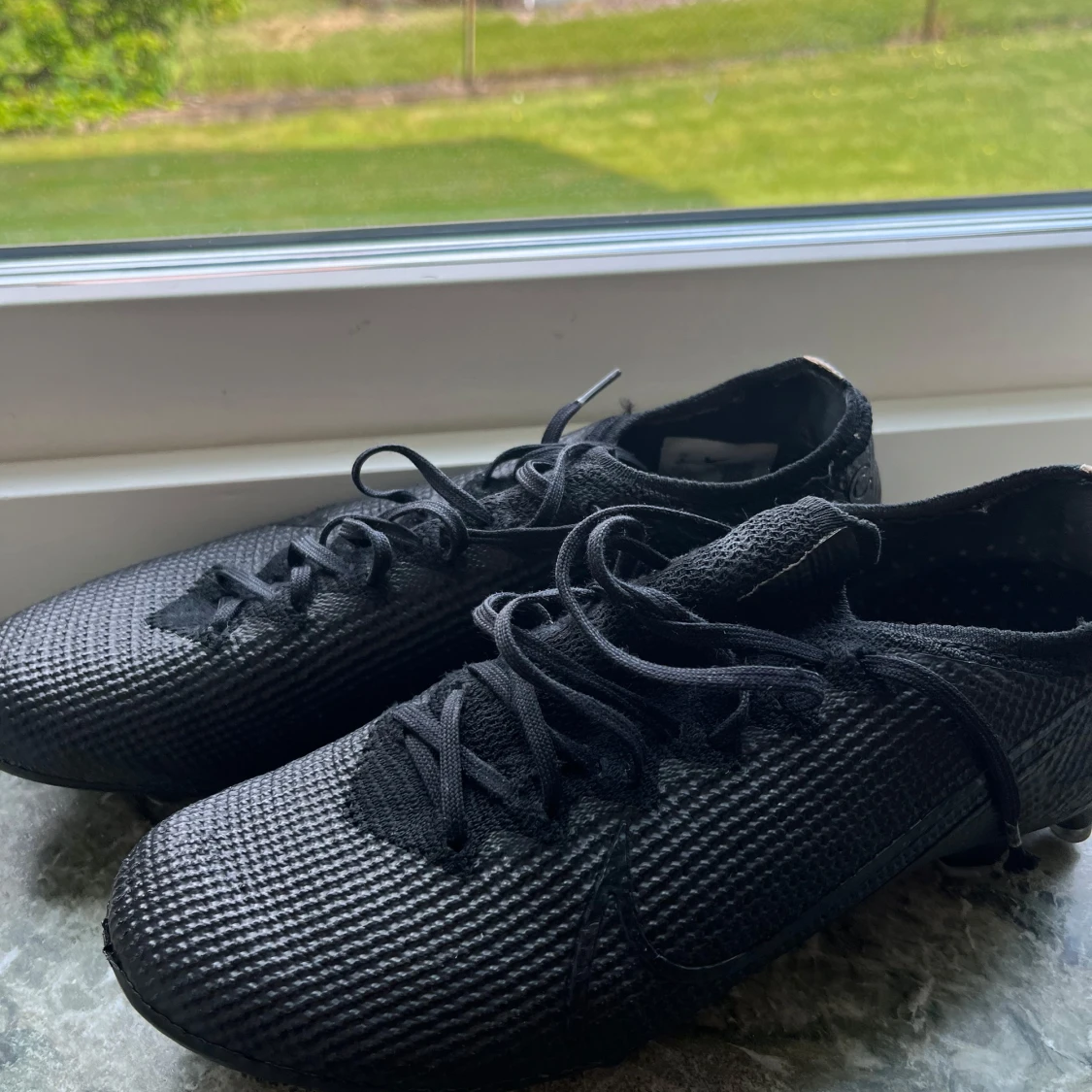 Svarta Nike Mercurial fotbollsskor