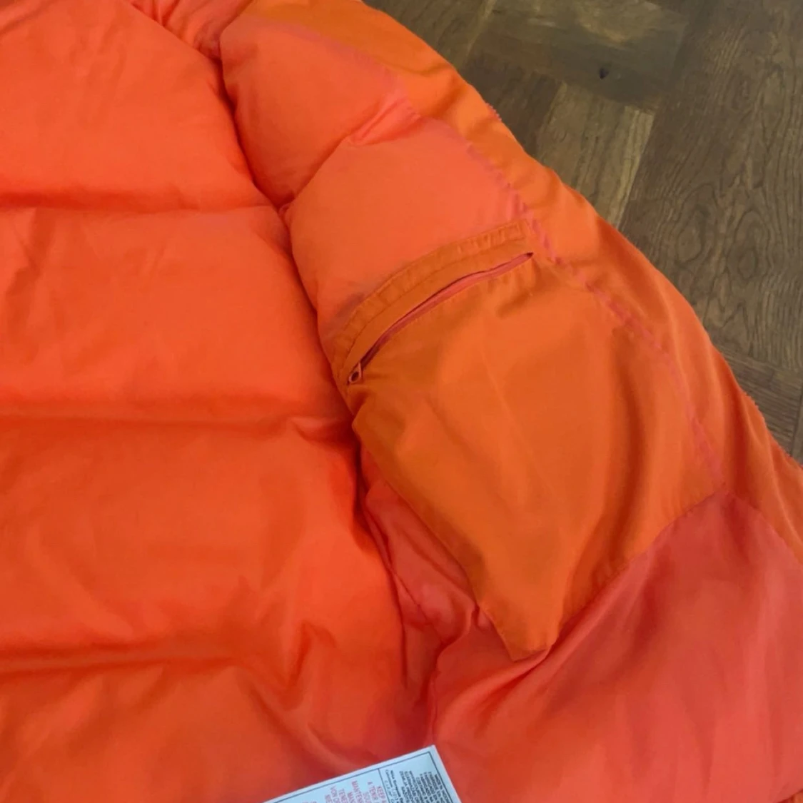 Orange dunväst från Nike med huva - 1