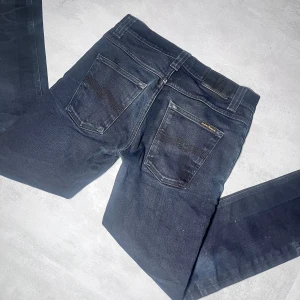 Nudie jeans - Nudie jeans | Modell Grim Tim | Super bra skick | Storlek W32 L32. 
