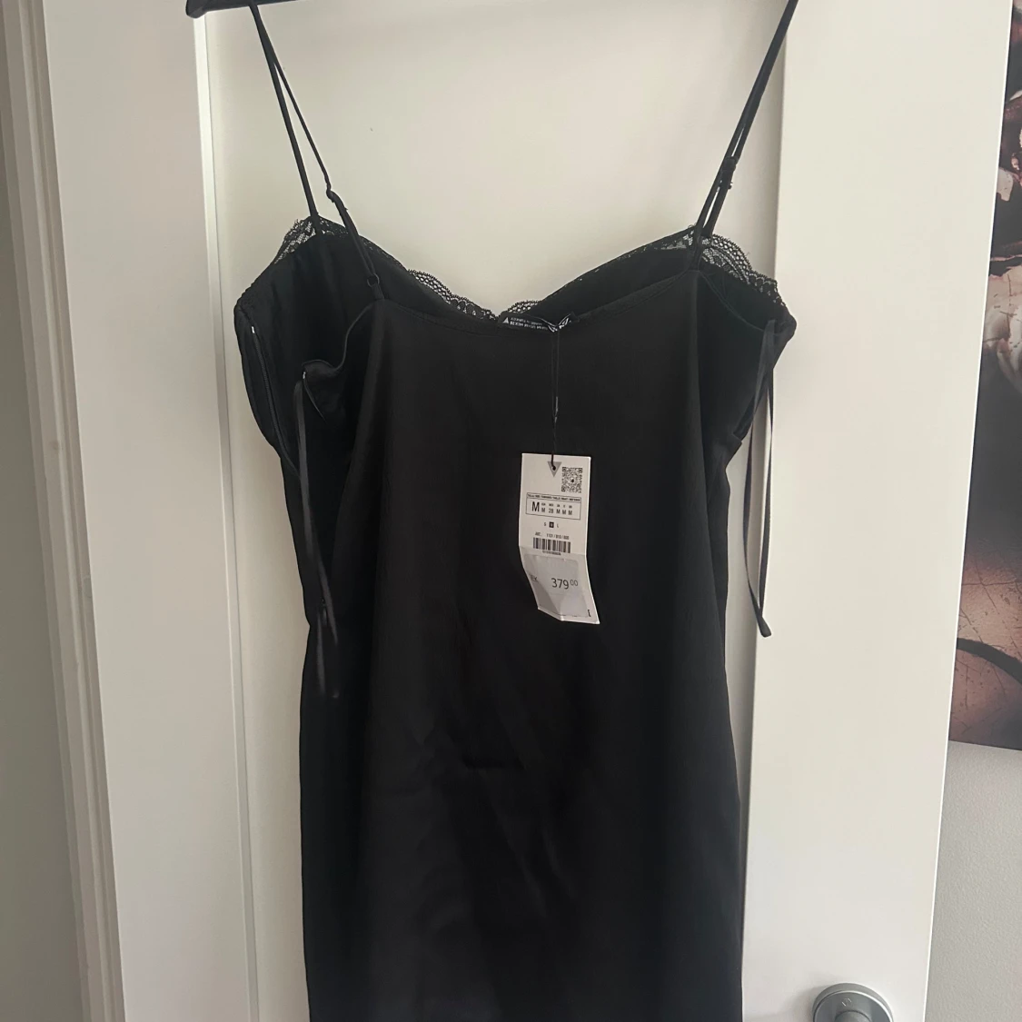 Svart spetsklänning - 1