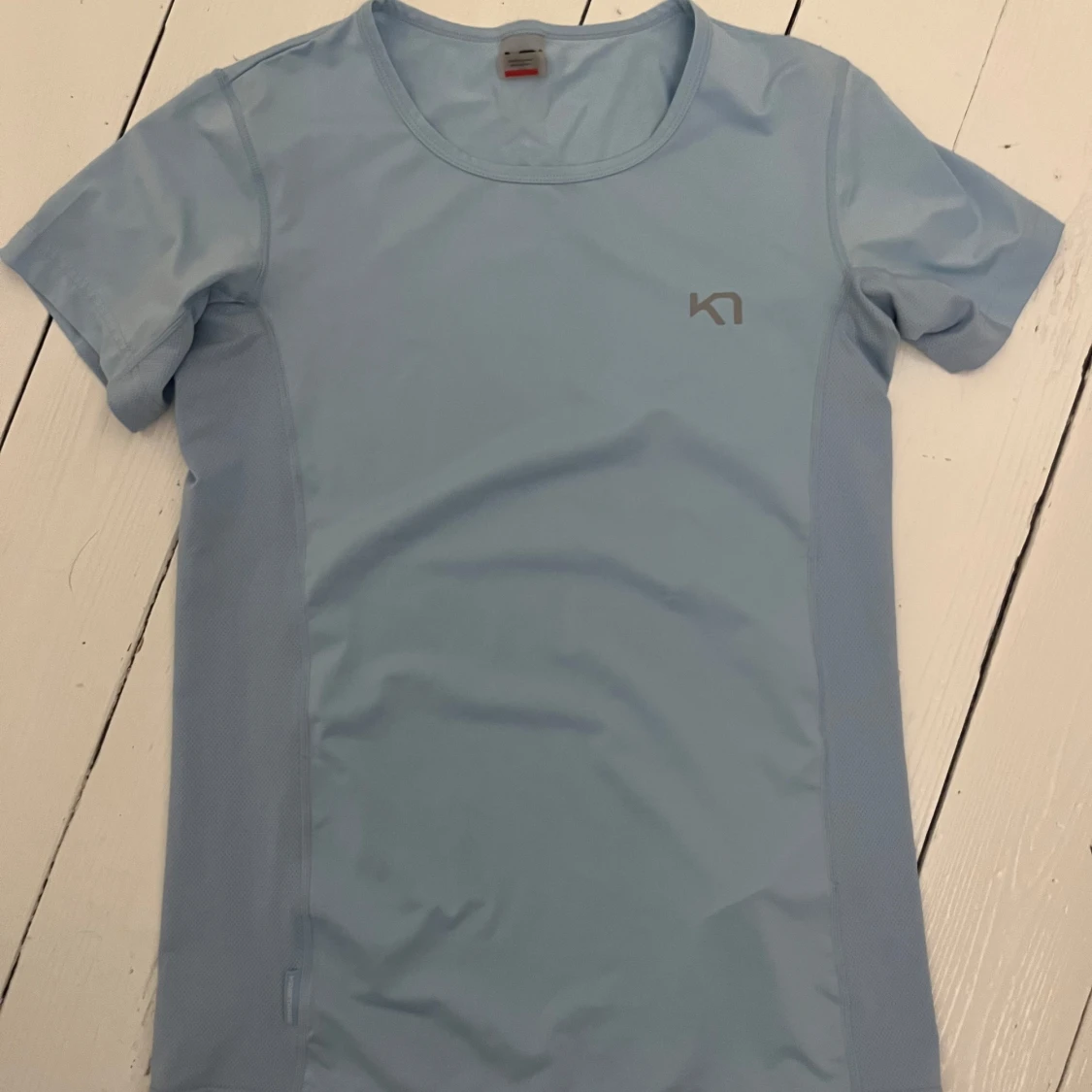 Ljusblå träningströja