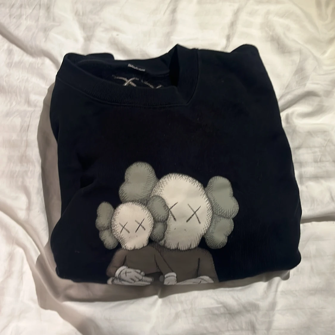 Sweat KAWS x uniqlo