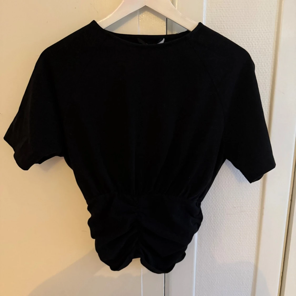 T-shirt med detaljerad midja - 4